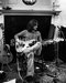 Photo of Mike OLDFIELD; Posed in studio, sitting on chair playing bass. Surrounded by guitar effects pedals and leads (Photo by Charlie Gillett/Redferns) (7) Comentarios